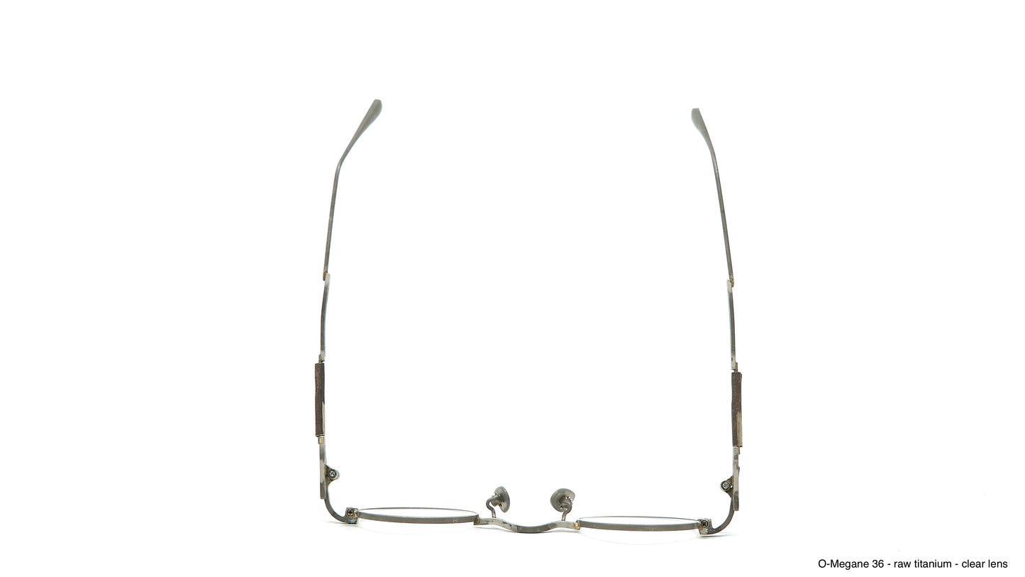 <span>TITANIUM FRAME + TITANIUM TEMPLE</span>O-MEGANE 36