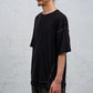 <span>27.1</span><span>"DISPLACEMENT"</span>T-SHIRTS S/S OVERSIZED<br>DRY COTTON JERSEY 60/1<br>BLACK